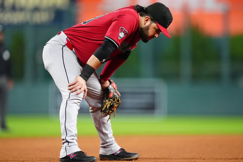 Sep 17, 2024; Denver, Colorado, USA; Arizona Diamondbacks third base Eugenio Suárez (28) during the fourth inning against the Colorado Rockies at Coors Field. Mandatory Credit: Ron Chenoy-Imagn Images