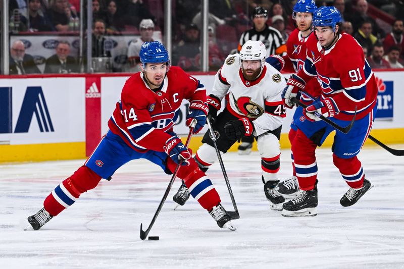 Jan 23, 2024; Montreal, Quebec, CAN; Montreal Canadiens center Nick Suzuki (14) plays the puck against the Ottawa Senators during the second period at Bell Centre. Mandatory Credit: David Kirouac-USA TODAY Sports