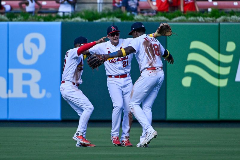 Sep 3, 2023; St. Louis, Missouri, USA;  St. Louis Cardinals center fielder Lars Nootbaar (21) left fielder Richie Palacios (67) and right fielder Jordan Walker (18) celebrate after the Cardinals defeated the Pittsburgh Pirates at Busch Stadium. Mandatory Credit: Jeff Curry-USA TODAY Sports