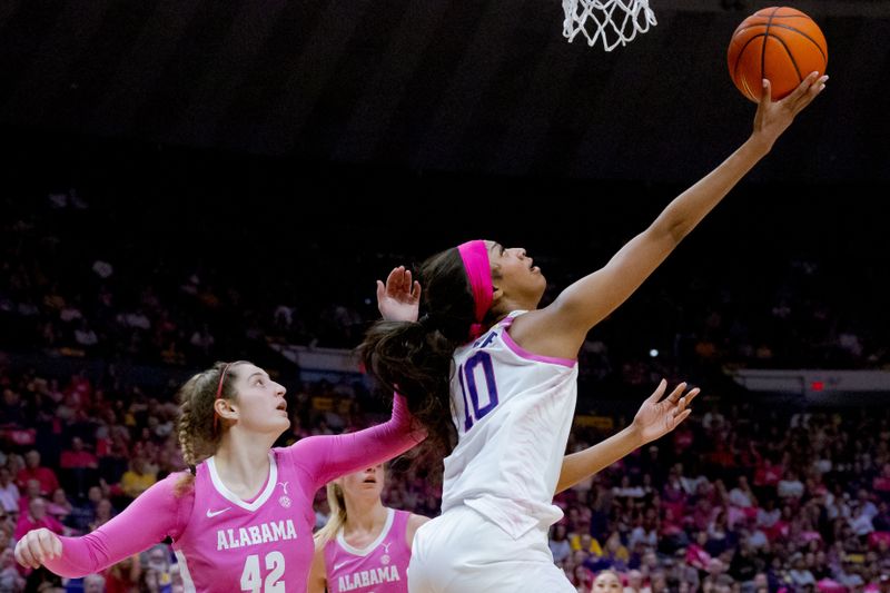 Feb 11, 2024; Baton Rouge, Louisiana, USA; LSU Lady Tigers forward Angel Reese (10) shoots against Alabama Crimson Tide forward Meg Newman (42) during the first half at Pete Maravich Assembly Center. Mandatory Credit: Matthew Hinton-USA TODAY Sports