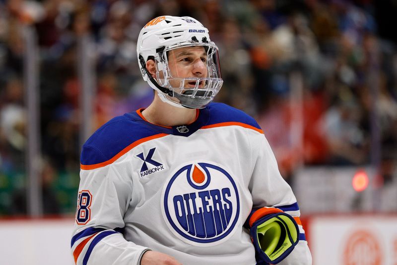 Jan 16, 2025; Denver, Colorado, USA; Edmonton Oilers left wing Zach Hyman (18) in the third period against the Colorado Avalanche at Ball Arena. Mandatory Credit: Isaiah J. Downing-Imagn Images