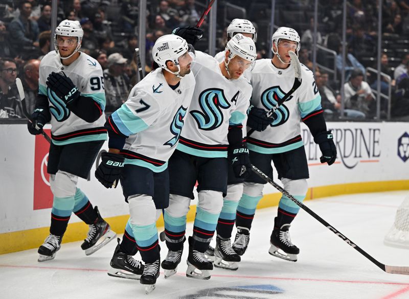 Oct 13, 2022; Los Angeles, California, USA; Seattle Kraken center Jaden Schwartz (17), center, is congratulated after scoring a goal in the first period against the Los Angeles Kings at Crypto.com Arena. Mandatory Credit: Jayne Kamin-Oncea-USA TODAY Sports