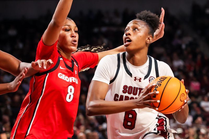 Jan 11, 2026; Columbia, South Carolina, USA; Georgia Bulldogs forward Zhen Craft (8) drives past Georgia Bulldogs forward Zhen Craft (8) in the first half at Colonial Life Arena. Mandatory Credit: Jeff Blake-Imagn Images
