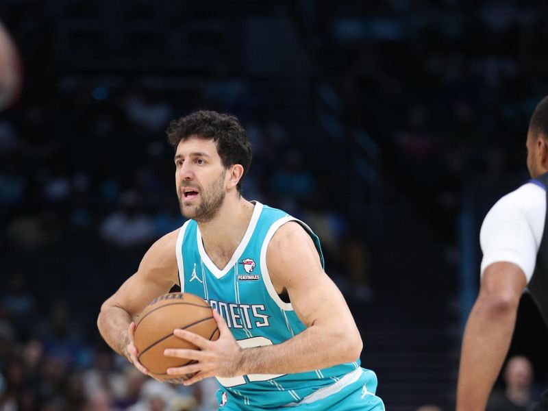 CHARLOTTE, NC - MARCH 31: Vasilije Micic #22 of the Charlotte Hornets  looks to pass the ball during the game against the LA Clippers on March 31, 2024 at Spectrum Center in Charlotte, North Carolina. NOTE TO USER: User expressly acknowledges and agrees that, by downloading and or using this photograph, User is consenting to the terms and conditions of the Getty Images License Agreement.  Mandatory Copyright Notice:  Copyright 2024 NBAE (Photo by Brock Williams-Smith/NBAE via Getty Images)