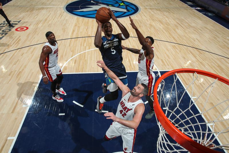 MINNEAPOLIS, MN -  NOVEMBER 10:  Anthony Edwards #5 of the Minnesota Timberwolves shoots the ball during the game against the Miami Heat on November 10, 2024 at Target Center in Minneapolis, Minnesota. NOTE TO USER: User expressly acknowledges and agrees that, by downloading and or using this Photograph, user is consenting to the terms and conditions of the Getty Images License Agreement. Mandatory Copyright Notice: Copyright 2024 NBAE (Photo by Jordan Johnson/NBAE via Getty Images)