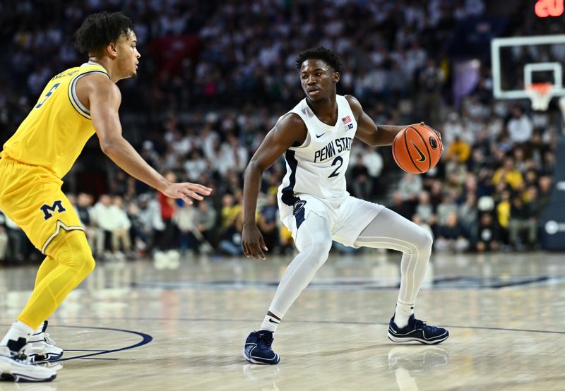 Jan 7, 2024; Philadelphia, Pennsylvania, USA; Penn State Nittany Lions guard D'Marco Dunn (2) controls the ball against Michigan Wolverines forward Terrance Williams II (5) in the first half at The Palestra. Mandatory Credit: Kyle Ross-USA TODAY Sports