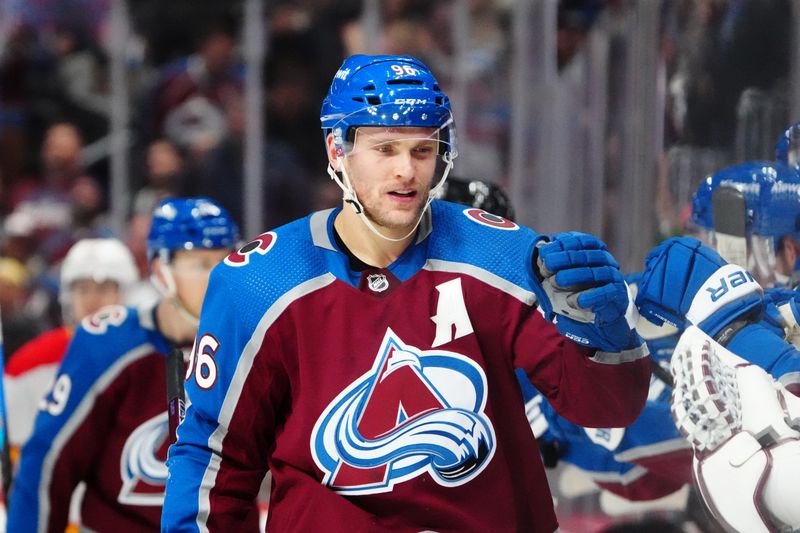 Dec 11, 2023; Denver, Colorado, USA; Colorado Avalanche right wing Mikko Rantanen (96) celebrates his goal in the third period against the Calgary Flames at Ball Arena. Mandatory Credit: Ron Chenoy-USA TODAY Sports