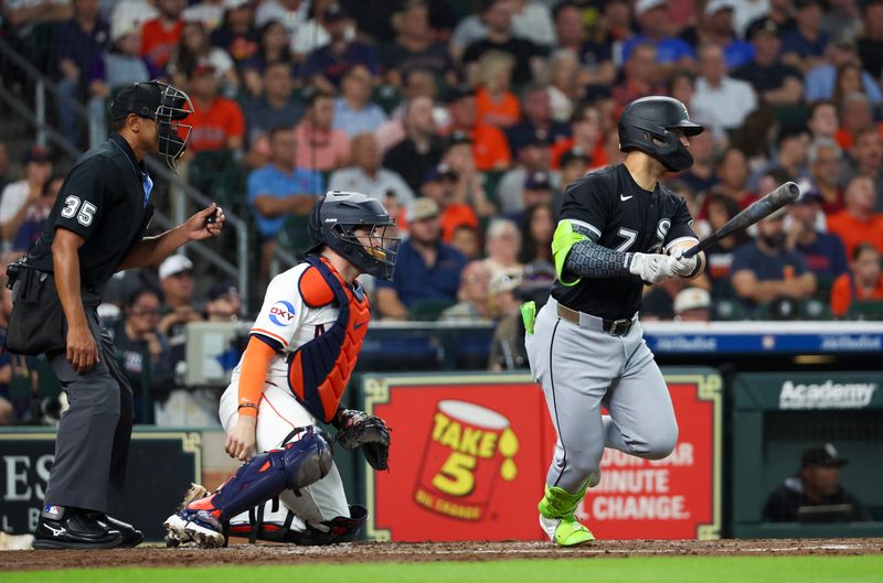Jun 10, 2025; Houston, Texas, USA; Chicago White Sox designated hitter Edgar Quero (7) hits a two run RBI single against the Houston Astros in the third inning at Daikin Park. Mandatory Credit: Thomas Shea-Imagn Images