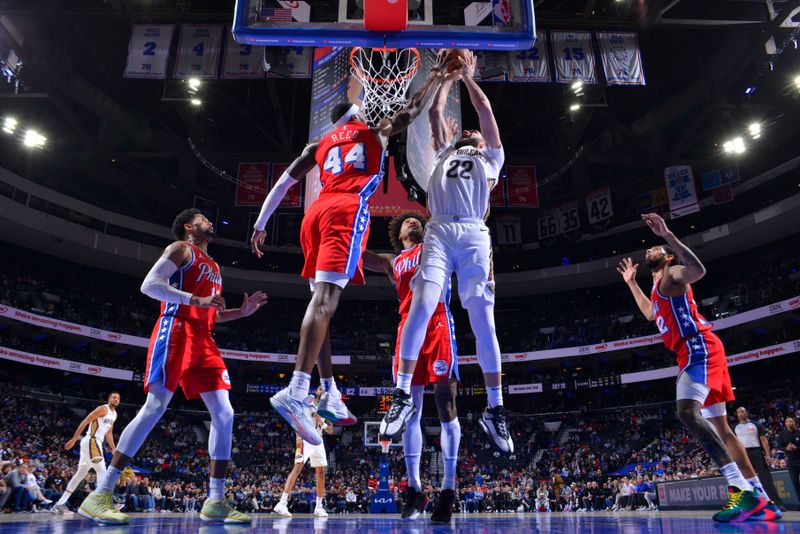 PHILADELPHIA, PA - MARCH 8: Paul Reed #44 of the Philadelphia 76ers blocks Larry Nance Jr. #22 of the New Orleans Pelicans during the game  on March 8, 2024 at the Wells Fargo Center in Philadelphia, Pennsylvania NOTE TO USER: User expressly acknowledges and agrees that, by downloading and/or using this Photograph, user is consenting to the terms and conditions of the Getty Images License Agreement. Mandatory Copyright Notice: Copyright 2024 NBAE (Photo by Jesse D. Garrabrant/NBAE via Getty Images)