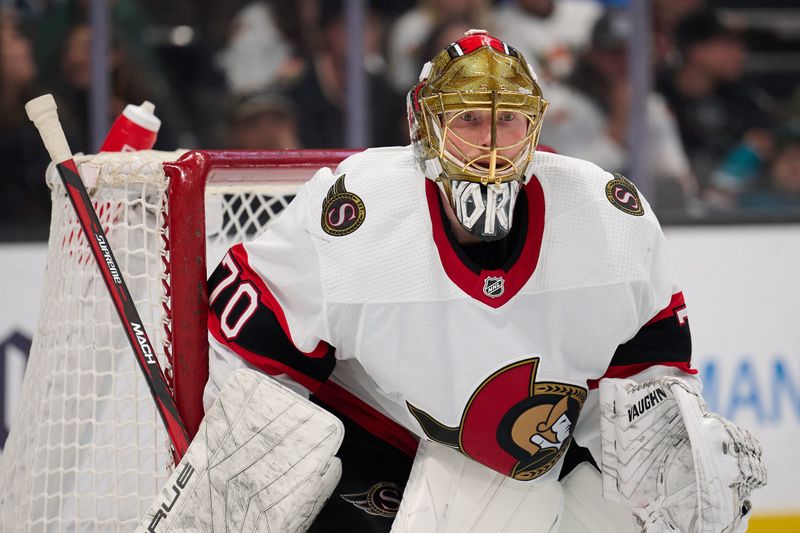 Mar 9, 2024; San Jose, California, USA; Ottawa Senators goaltender Joonas Korpisalo (70) watches the play against the San Jose Sharks during the second period at SAP Center at San Jose. Mandatory Credit: Robert Edwards-USA TODAY Sports