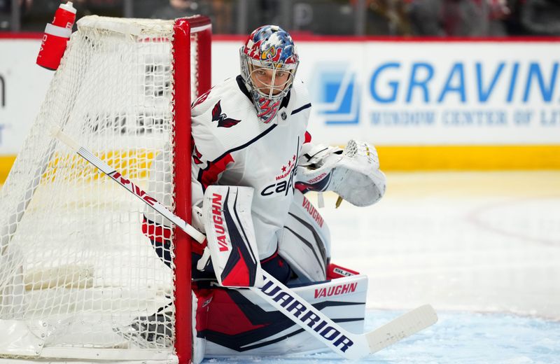 Jan 24, 2023; Denver, Colorado, USA; Washington Capitals goaltender Darcy Kuemper (35) defends his net in the second period against the Colorado Avalanche at Ball Arena. Mandatory Credit: Ron Chenoy-USA TODAY Sports