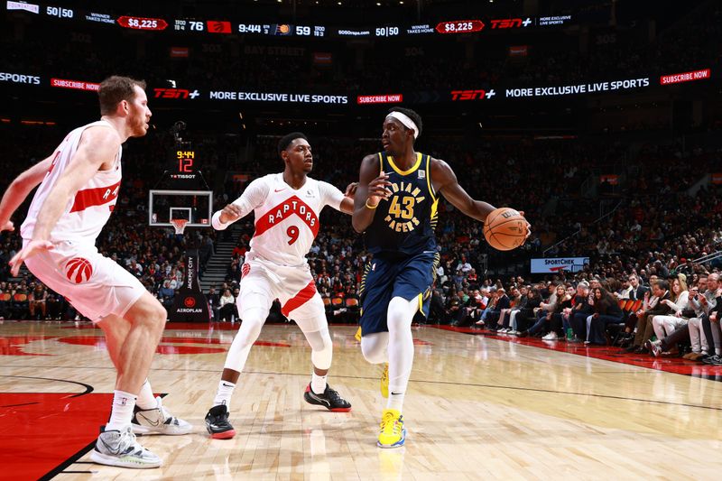 TORONTO, CANADA - NOVEMBER 18: Pascal Siakam #43 of the Indiana Pacers looks on during the game against the Toronto Raptors on November 18, 2024 at the Scotiabank Arena in Toronto, Ontario, Canada.  NOTE TO USER: User expressly acknowledges and agrees that, by downloading and or using this Photograph, user is consenting to the terms and conditions of the Getty Images License Agreement.  Mandatory Copyright Notice: Copyright 2024 NBAE (Photo by Vaughn Ridley/NBAE via Getty Images)