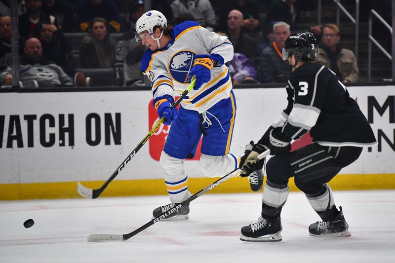 Feb 13, 2023; Los Angeles, California, USA; Buffalo Sabres center Tage Thompson (72) shoots on goal against the defense of Los Angeles Kings defenseman Matt Roy (3) during the first period at Crypto.com Arena. Mandatory Credit: Gary A. Vasquez-USA TODAY Sports