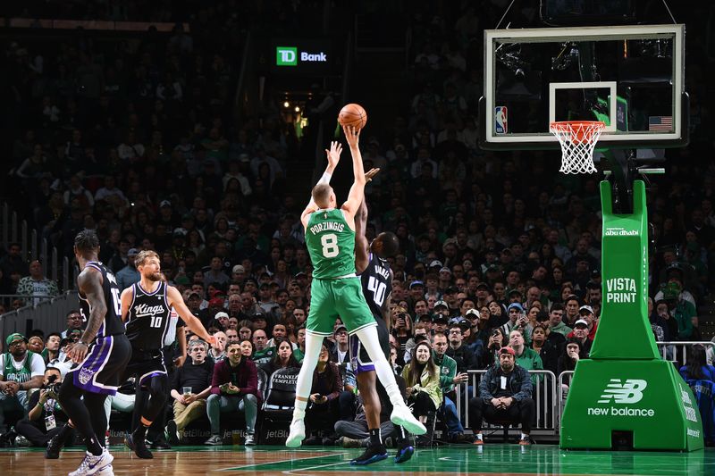 BOSTON, MA - APRIL 5:  Kristaps Porzingis #8 of the Boston Celtics shoots the ball during the game against the Sacramento Kings on April 5, 2024 at the TD Garden in Boston, Massachusetts. NOTE TO USER: User expressly acknowledges and agrees that, by downloading and or using this photograph, User is consenting to the terms and conditions of the Getty Images License Agreement. Mandatory Copyright Notice: Copyright 2024 NBAE  (Photo by Brian Babineau/NBAE via Getty Images)