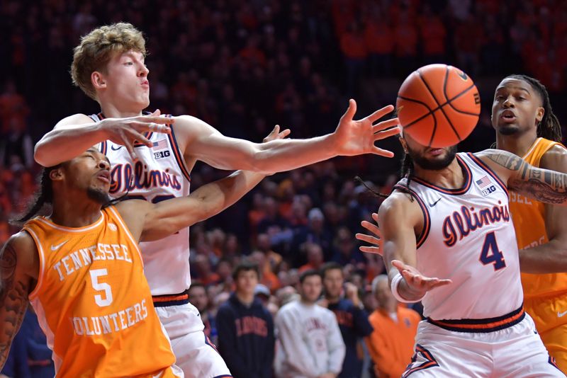 Dec 14, 2024; Champaign, Illinois, USA;  Illinois Fighting Illini forward Ben Humrichous (3) and Tennessee Volunteers guard Zakai Zeigler (5) reach for a loose ball during the first half at State Farm Center. Mandatory Credit: Ron Johnson-Imagn Images