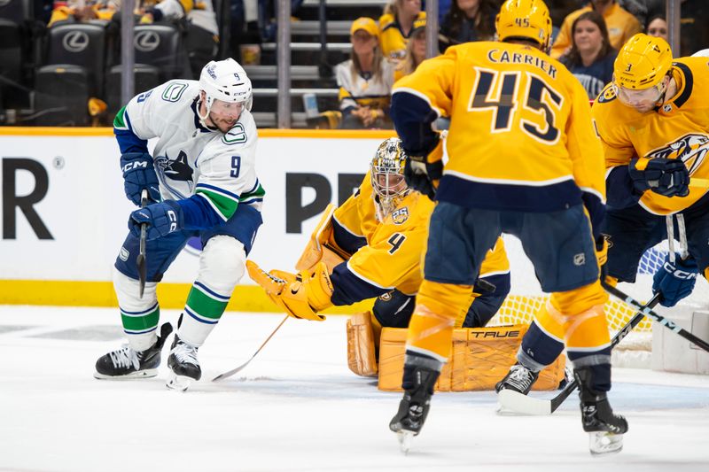 May 3, 2024; Nashville, Tennessee, USA; Nashville Predators goaltender Juuse Saros (74) blocks the shot of Vancouver Canucks center J.T. Miller (9) during the second period in game six of the first round of the 2024 Stanley Cup Playoffs at Bridgestone Arena. Mandatory Credit: Steve Roberts-USA TODAY Sports