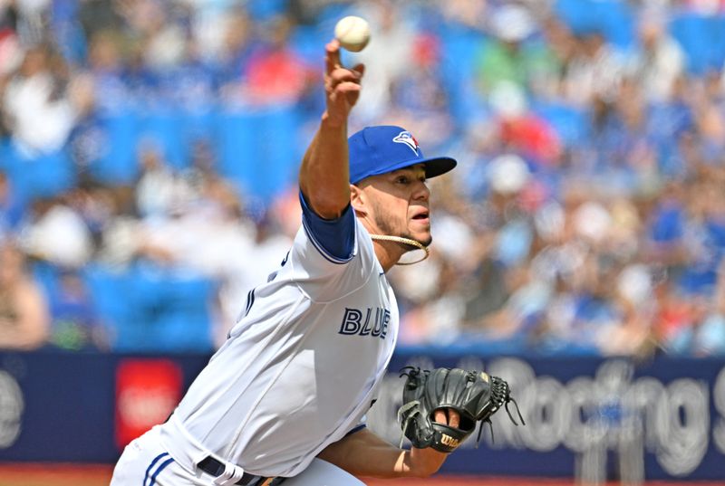 May 13, 2023; Toronto, Ontario, CAN; Toronto Blue Jays starting pitcher Jose Berrios (17) delivers a pitch against the Atlanta Braves in the first inning at Rogers Centre. Mandatory Credit: Dan Hamilton-USA TODAY Sports