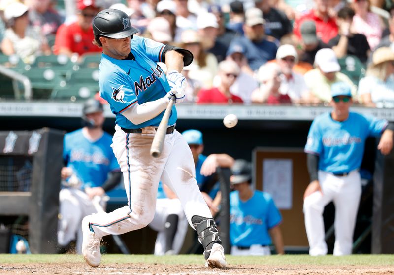 Mar 16, 2025; Jupiter, Florida, USA;  Miami Marlins first baseman Jonah Bride (41) hit a home run against the St' Louis Cardinals during the third inning at Roger Dean Chevrolet Stadium. Mandatory Credit: Rhona Wise-Imagn Images