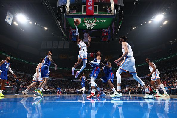 OKLAHOMA CITY, OK - DECEMBER 21: Shai Gilgeous-Alexander #2 of the Oklahoma City Thunder drives to the basket during the game against the LA Clippers on December 21, 2023 at Paycom Arena in Oklahoma City, Oklahoma. NOTE TO USER: User expressly acknowledges and agrees that, by downloading and or using this photograph, User is consenting to the terms and conditions of the Getty Images License Agreement. Mandatory Copyright Notice: Copyright 2023 NBAE (Photo by Zach Beeker/NBAE via Getty Images)