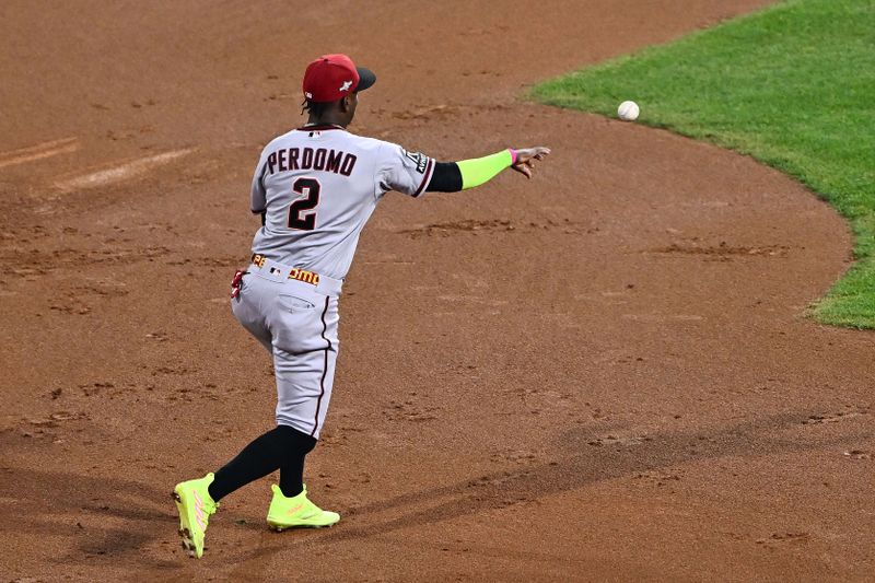 Oct 24, 2023; Philadelphia, Pennsylvania, USA; Arizona Diamondbacks shortstop Geraldo Perdomo (2) makes a throw to first base against the Philadelphia Phillies in the second inning during game seven of the NLCS for the 2023 MLB playoffs at Citizens Bank Park. Mandatory Credit: Kyle Ross-USA TODAY Sports