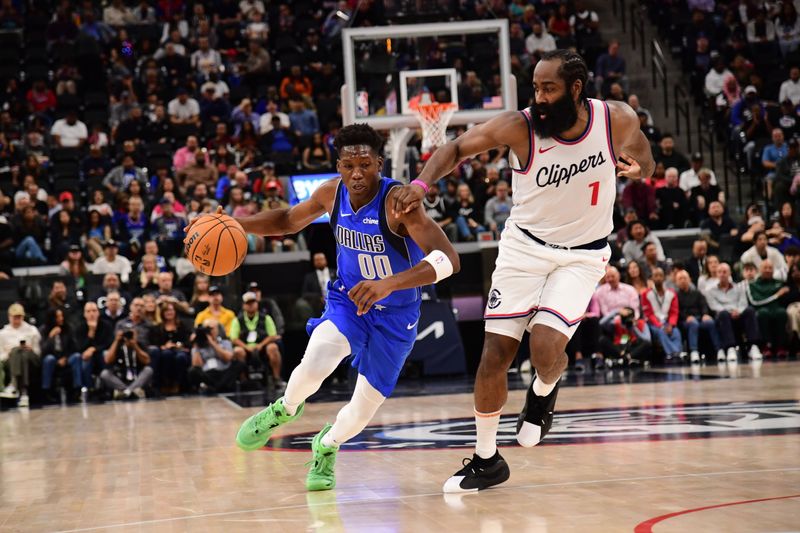 INGLEWOOD, CA - OCTOBER 14: Jazian Gortman #00 of the Dallas Mavericks handles the ball during the game against the LA Clippers during a NBA Preseason game on October 14, 2024 at the Intuit Dome in Inglewood, California. NOTE TO USER: User expressly acknowledges and agrees that, by downloading and/or using this Photograph, user is consenting to the terms and conditions of the Getty Images License Agreement. Mandatory Copyright Notice: Copyright 2024 NBAE (Photo by Adam Pantozzi/NBAE via Getty Images)