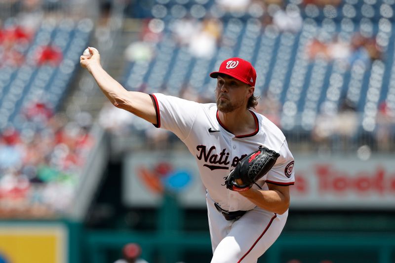 Jul 21, 2024; Washington, District of Columbia, USA; Washington Nationals starting pitcher Jake Irvin (27) pitches against the Cincinnati Reds during the second inning at Nationals Park. Mandatory Credit: Geoff Burke-USA TODAY Sports