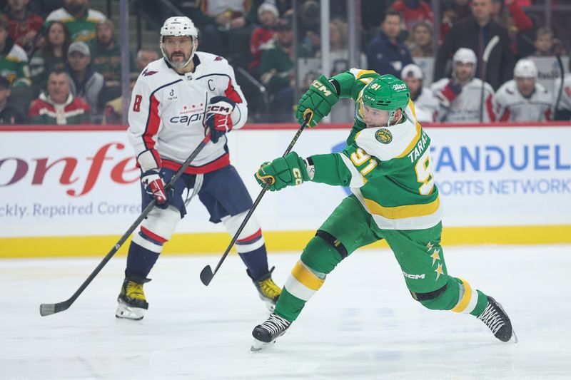 Dec 16, 2025; Saint Paul, Minnesota, USA; Minnesota Wild right wing Vladimir Tarasenko (91) shoots the puck against the Washington Capitals during the first period at Grand Casino Arena. Mandatory Credit: Matt Krohn-Imagn Images
