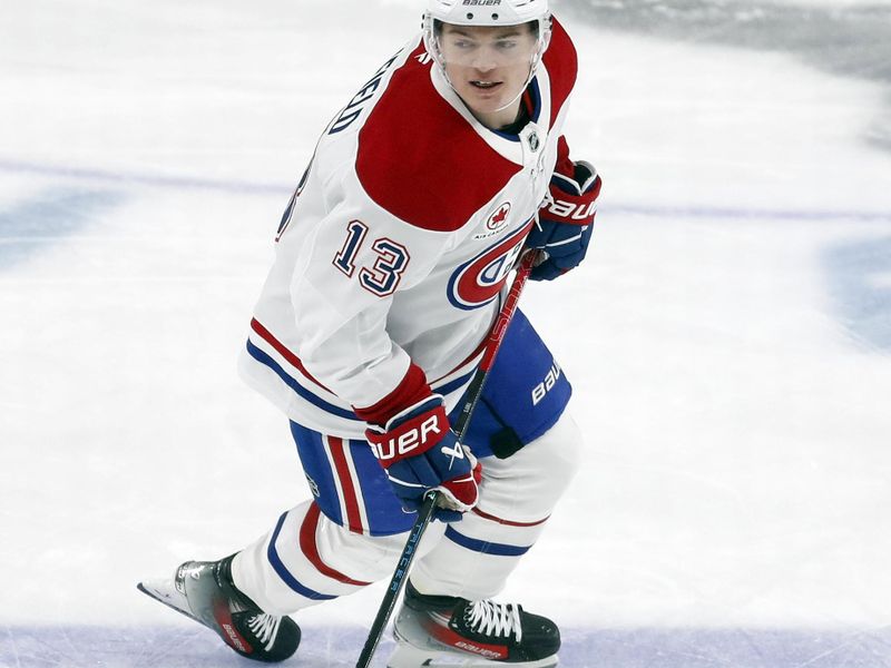 Nov 2, 2024; Pittsburgh, Pennsylvania, USA;  Montreal Canadiens right wing Cole Caufield (13) warms up against the Pittsburgh Penguins at PPG Paints Arena. Mandatory Credit: Charles LeClaire-Imagn Images