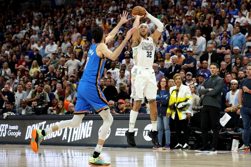 DENVER, COLORADO - MAY 15: Aaron Gordon #32 of the Denver Nuggets shoots the ball against Chet Holmgren #7 of the Oklahoma City Thunder during the first quarter in Game Six of the Western Conference Second Round NBA Playoffs at Ball Arena on May 15, 2025 in Denver, Colorado. NOTE TO USER: User expressly acknowledges and agrees that, by downloading and or using this photograph, User is consenting to the terms and conditions of the Getty Images License Agreement. (Photo by Matthew Stockman/Getty Images)