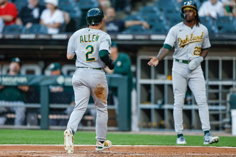 Aug 25, 2023; Chicago, Illinois, USA; Oakland Athletics shortstop Nick Allen (2) scores against the Chicago White Sox during the second inning at Guaranteed Rate Field. Mandatory Credit: Kamil Krzaczynski-USA TODAY Sports