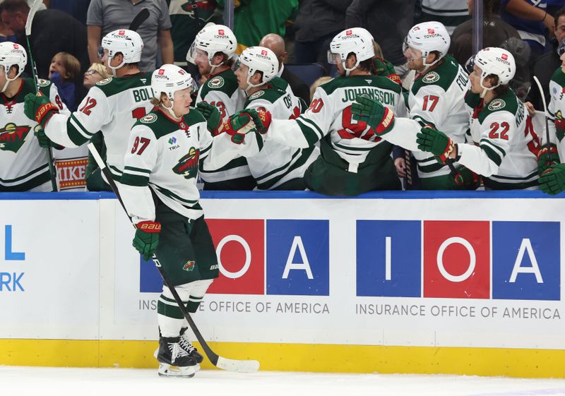 Oct 24, 2024; Tampa, Florida, USA; Minnesota Wild left wing Kirill Kaprizov (97) celebrates after he scored a goal against the Tampa Bay Lightning during the third period at Amalie Arena. Mandatory Credit: Kim Klement Neitzel-Imagn Images