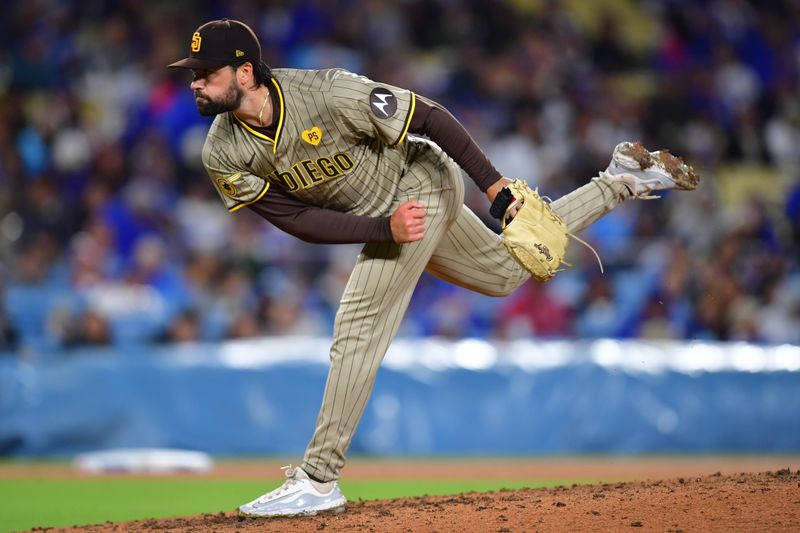 Apr 13, 2024; Los Angeles, California, USA; San Diego Padres starting pitcher Matt Waldron (61) throws against the Los Angeles Dodgers during the fourth inning at Dodger Stadium. Mandatory Credit: Gary A. Vasquez-USA TODAY Sports
