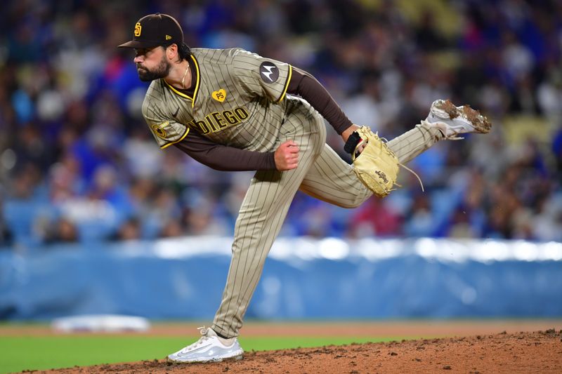 Apr 13, 2024; Los Angeles, California, USA; San Diego Padres starting pitcher Matt Waldron (61) throws against the Los Angeles Dodgers during the fourth inning at Dodger Stadium. Mandatory Credit: Gary A. Vasquez-USA TODAY Sports