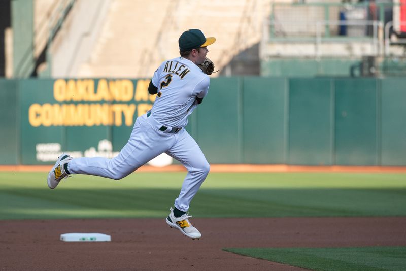 Aug 22, 2023; Oakland, California, USA; Oakland Athletics shortstop Nick Allen (2) throws to first base during the first inning against the Kansas City Royals at Oakland-Alameda County Coliseum. Mandatory Credit: Ed Szczepanski-USA TODAY Sports