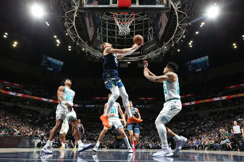 MINNEAPOLIS, MN -  NOVEMBER 4: Donte DiVincenzo #0 of the Minnesota Timberwolves drives to the basket during the game against the Charlotte Hornets on November 4, 2024 at Target Center in Minneapolis, Minnesota. NOTE TO USER: User expressly acknowledges and agrees that, by downloading and or using this Photograph, user is consenting to the terms and conditions of the Getty Images License Agreement. Mandatory Copyright Notice: Copyright 2024 NBAE (Photo by David Sherman/NBAE via Getty Images)