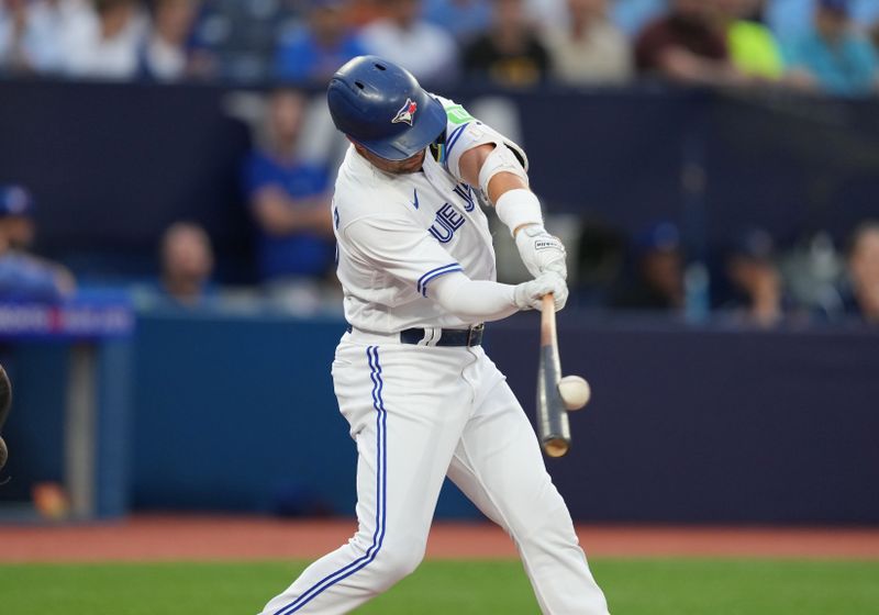 Aug 11, 2023; Toronto, Ontario, CAN; Toronto Blue Jays left fielder Whit Merrifield (15) hits a single against the Chicago Cubs during the third inning at Rogers Centre. Mandatory Credit: Nick Turchiaro-USA TODAY Sports