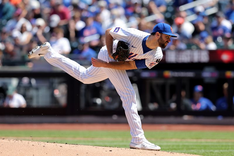 Apr 23, 2025; New York City, New York, USA; New York Mets starting pitcher David Peterson (23) follows through on a pitch against the Philadelphia Phillies during the second inning at Citi Field. Mandatory Credit: Brad Penner-Imagn Images