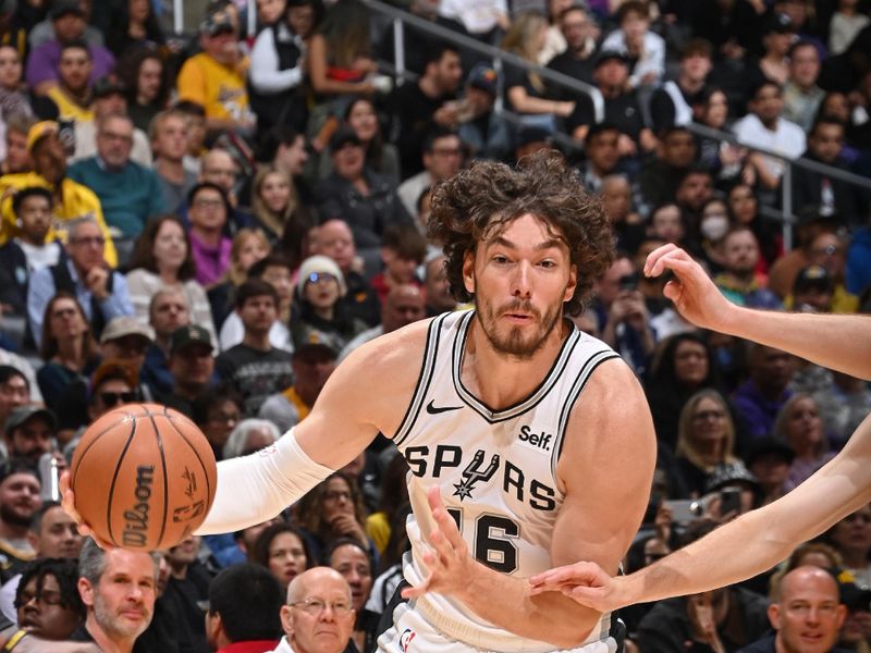 LOS ANGELES, CA - FEBRUARY 23: Cedi Osman #16 of the San Antonio Spurs handles the ball during the game against the Los Angeles Lakers on Feburary 23, 2024 at Crypto.Com Arena in Los Angeles, California. NOTE TO USER: User expressly acknowledges and agrees that, by downloading and/or using this Photograph, user is consenting to the terms and conditions of the Getty Images License Agreement. Mandatory Copyright Notice: Copyright 2024 NBAE (Photo by Andrew D. Bernstein/NBAE via Getty Images)