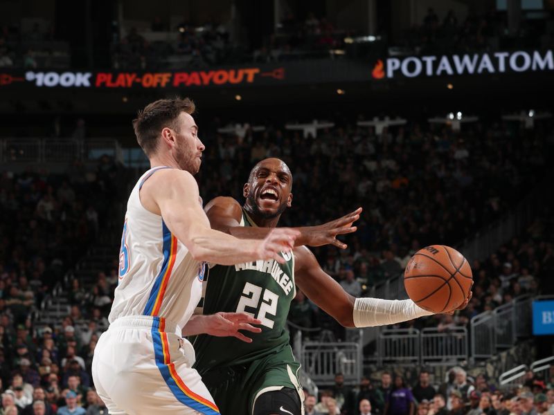 MILWAUKEE, WI - MARCH 24: Khris Middleton #22 of the Milwaukee Bucks handles the ball during the game against the Oklahoma City Thunder on March 24, 2024 at the Fiserv Forum Center in Milwaukee, Wisconsin. NOTE TO USER: User expressly acknowledges and agrees that, by downloading and or using this Photograph, user is consenting to the terms and conditions of the Getty Images License Agreement. Mandatory Copyright Notice: Copyright 2024 NBAE (Photo by Gary Dineen/NBAE via Getty Images).