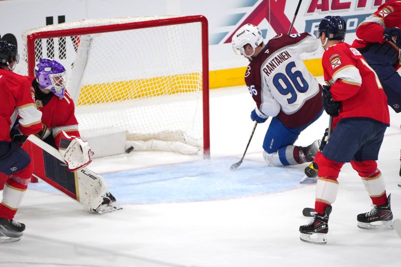 Nov 23, 2024; Sunrise, Florida, USA;  Colorado Avalanche right wing Mikko Rantanen (96) scores a goal against the Florida Panthers in the second period at Amerant Bank Arena. Mandatory Credit: Jim Rassol-Imagn Images