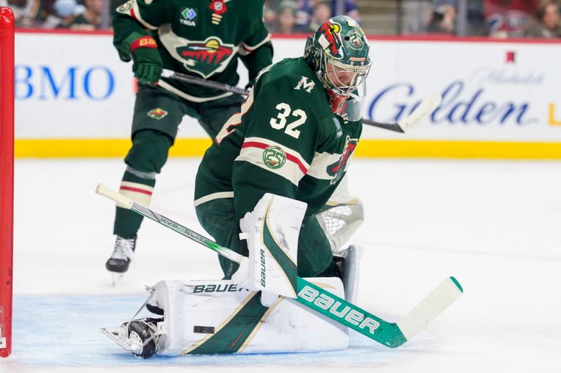 Feb 2, 2026; Saint Paul, Minnesota, USA; Minnesota Wild goaltender Filip Gustavsson (32) makes a save against the Montreal Canadiens in the first period at Grand Casino Arena. Mandatory Credit: Matt Blewett-Imagn Images