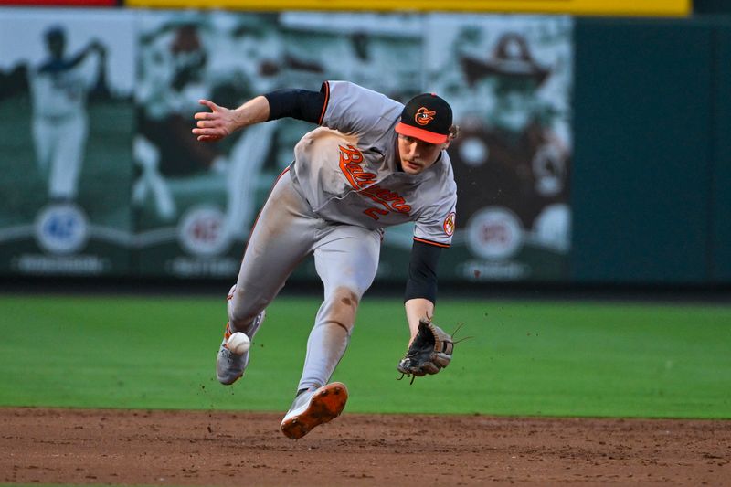 May 20, 2024; St. Louis, Missouri, USA;  Baltimore Orioles shortstop Gunnar Henderson (2) fields a ground ball against the St. Louis Cardinals during the third inning at Busch Stadium. Mandatory Credit: Jeff Curry-USA TODAY Sports