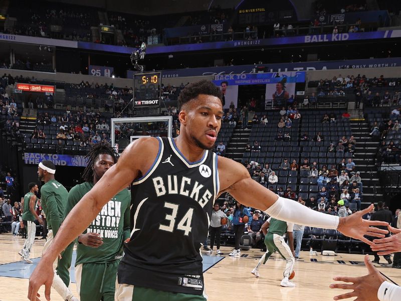 MEMPHIS, TN - FEBRUARY 15: Giannis Antetokounmpo #34 of the Milwaukee Bucks high fives teammates before the game against the Memphis Grizzlies on February 15, 2024 at FedExForum in Memphis, Tennessee. NOTE TO USER: User expressly acknowledges and agrees that, by downloading and or using this photograph, User is consenting to the terms and conditions of the Getty Images License Agreement. Mandatory Copyright Notice: Copyright 2024 NBAE (Photo by Stephen Gosling/NBAE via Getty Images)