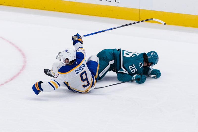 Nov 23, 2024; San Jose, California, USA; Buffalo Sabres left wing Zach Benson (9) and San Jose Sharks defenseman Jack Thompson (26) collide during the third period at SAP Center in San Jose. Mandatory Credit: John Hefti-Imagn Images