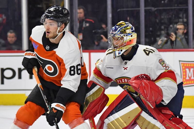 Mar 24, 2024; Philadelphia, Pennsylvania, USA; Philadelphia Flyers left wing Joel Farabee (86) battle for position against Florida Panthers goaltender Anthony Stolarz (41) during the first period at Wells Fargo Center. Mandatory Credit: Eric Hartline-USA TODAY Sports