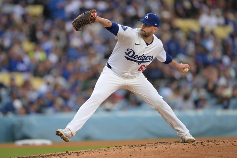 Apr 14, 2024; Los Angeles, California, USA; Los Angeles Dodgers pitcher James Paxton (65) throws to the plate in the fourth inning against the San Diego Padres at Dodger Stadium. Mandatory Credit: Jayne Kamin-Oncea-USA TODAY Sports