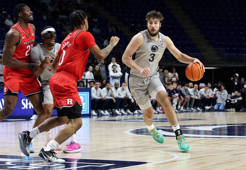 Feb 18, 2026; University Park, Pennsylvania, USA; Penn State Nittany Lions forward Ivan Juric (3) dribbles the ball during the first half against the Rutgers Scarlet Knights at Bryce Jordan Center. Mandatory Credit: Matthew O'Haren-Imagn Images