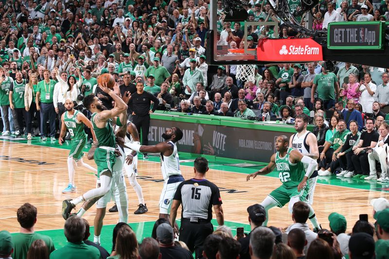 BOSTON, MA - JUNE 17: Jayson Tatum #0 of the Boston Celtics drives to the basket during the game against the Dallas Mavericks during Game 5 of the 2024 NBA Finals on June 17, 2024 at the TD Garden in Boston, Massachusetts. NOTE TO USER: User expressly acknowledges and agrees that, by downloading and or using this photograph, User is consenting to the terms and conditions of the Getty Images License Agreement. Mandatory Copyright Notice: Copyright 2024 NBAE  (Photo by Nathaniel S. Butler/NBAE via Getty Images)