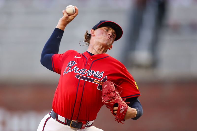 Sep 12, 2025; Atlanta, Georgia, USA; Atlanta Braves starting pitcher Hurston Waldrep (64) throws against the Houston Astros in the first inning at Truist Park. Mandatory Credit: Brett Davis-Imagn Images