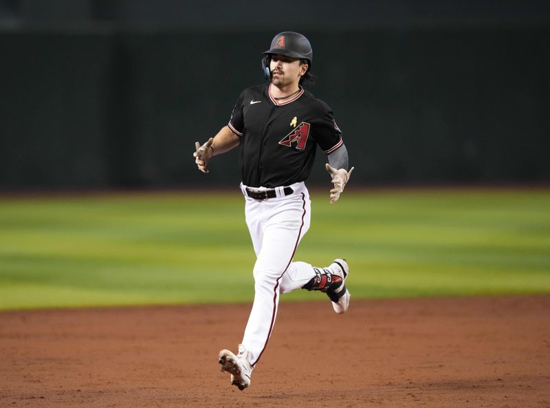 Sep 3, 2023; Phoenix, Arizona, USA; Arizona Diamondbacks right fielder Corbin Carroll (7) runs the bases after hitting a solo home run against the Baltimore Orioles during the third inning at Chase Field. Mandatory Credit: Joe Camporeale-USA TODAY Sports